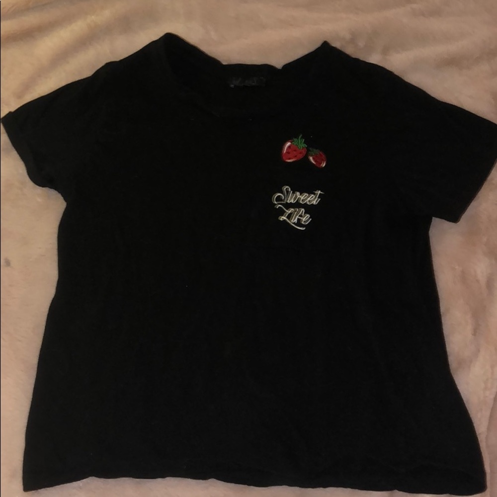 Black T-shirt with pocket and decal